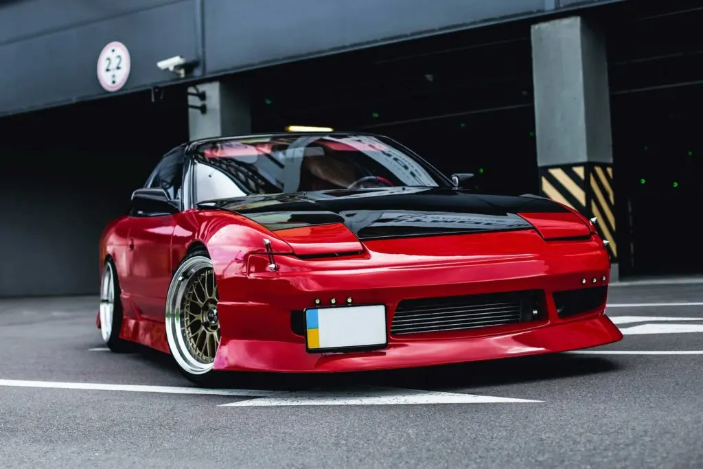 Detailed red vehicle under dramatic lighting